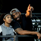 In this file photo legendary Los Angeles Laker Kobe Bryant and his daughter Gianna watch the U.S. national championships swimming meet Thursday, July 26, 2018, in Irvine, Calif.